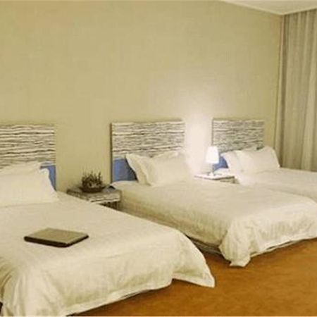 The Land Hotel Shanghai Bagian luar foto