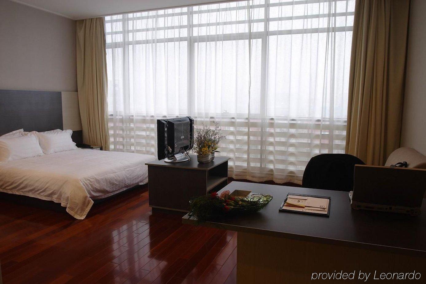 The Land Hotel Shanghai Ruang foto